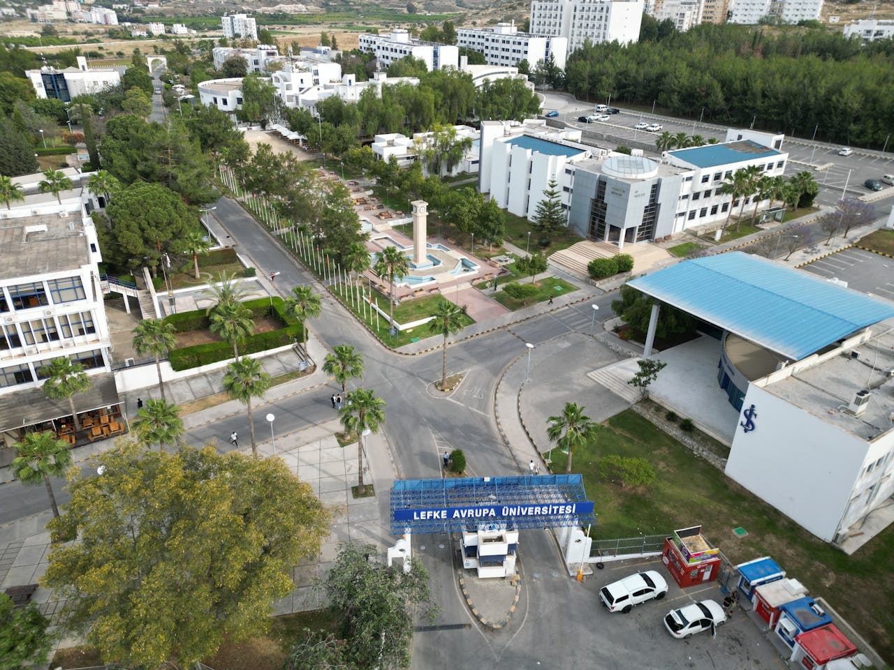 Aerial view of Lefke European University campus showcasing buildings and greenery.